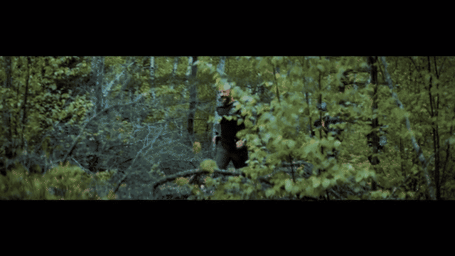 Man runs through woods to find his family at the finish line of the boundary water traverse